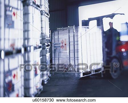 Chemicals on forklift truck in port View Large Photo Image Stock Image - Chemicals on forklift truck in port. Fotosearch