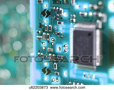 Stock Image - Close up of a circuit board used to connect electrical components to form a circuit. Fotosearch