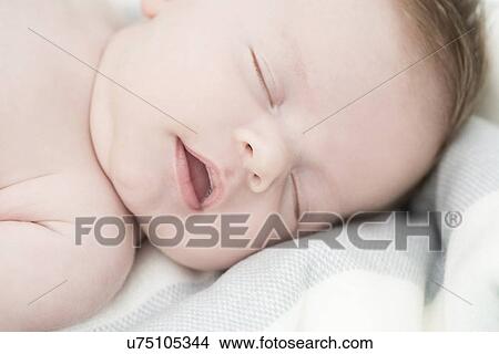 Close up of baby sleeping View Large Photo Image Picture - Close up of baby sleeping. Fotosearch