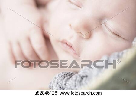 Stock Photo - Close up of baby sleeping. Fotosearch