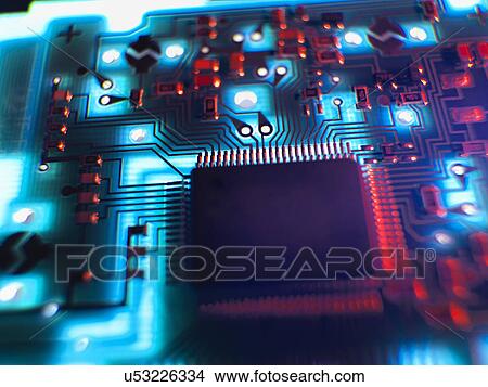 Close up of illuminated printed circuit board View Large Photo Image Picture - Close up of illuminated printed circuit board. Fotosearch