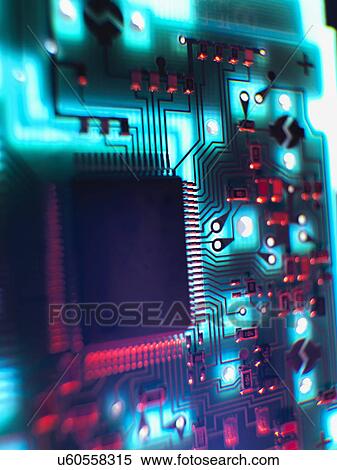 Close up of illuminated printed circuit board View Large Photo Image Stock Photography - Close up of illuminated printed circuit board. Fotosearch