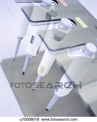 Stock Photo - Close up of pipettes in laboratory. Fotosearch