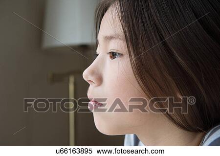 Close up portrait of serious girl View Large Photo Image Stock Photography - Close up portrait of serious girl. Fotosearch