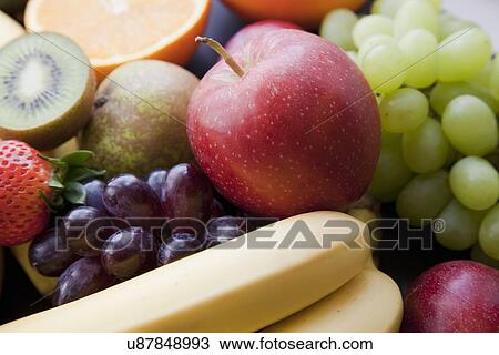 Stock Image - Close up still life with variety of fruit. Fotosearch