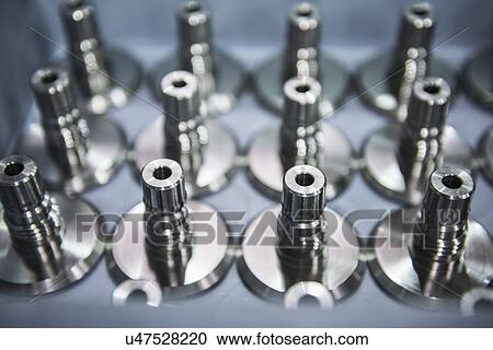 Stock Image - Close up view of engineered parts detail. Fotosearch