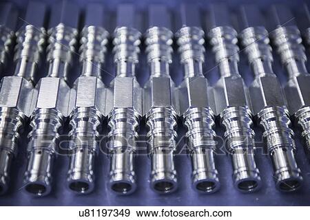 Stock Photo - Close up view of engineered parts. Fotosearch