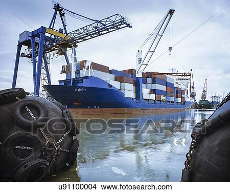 Picture - "Container ship docked in port, Grimsby, England, United Kingdom". Fotosearch