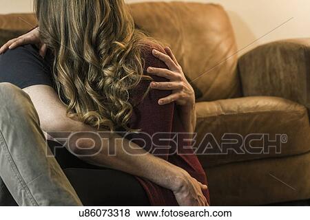 Stock Photo - Couple hugging. Fotosearch