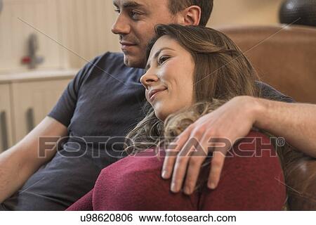 Stock Photograph - Couple relaxing together. Fotosearch