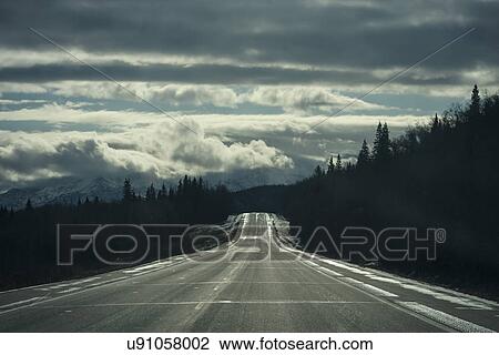 Stock Image - "Empty road, Homer, Alaska". Fotosearch