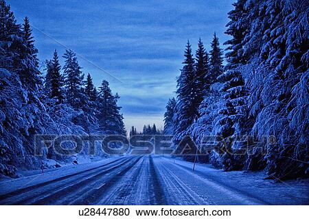 "Empty snow covered highway at dusk, Hemavan, Sweden" View Large Photo Image Stock Image - "Empty snow covered highway at dusk, Hemavan, Sweden". Fotosearch