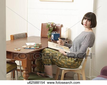 Picture - Female artist at work. Fotosearch