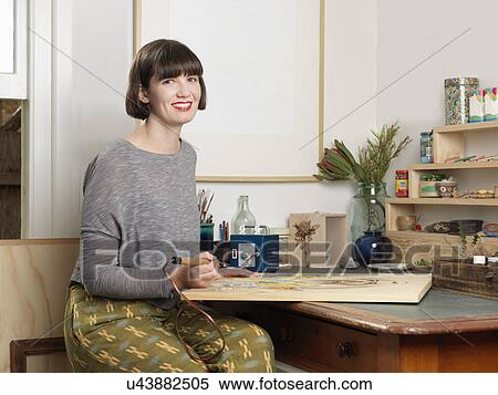 Stock Photography - Female artist at work. Fotosearch