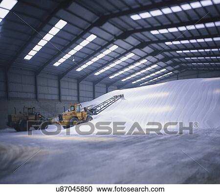 Stock Image - Fertiliser store in port building. Fotosearch