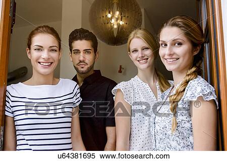 "Four people looking at camera, portrait" View Large Photo Image Stock Photography - "Four people looking at camera, portrait". Fotosearch