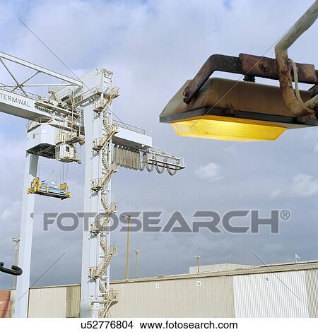 "Gantry crane in port, low angle view" View Large Photo Image Picture - "Gantry crane in port, low angle view". Fotosearch