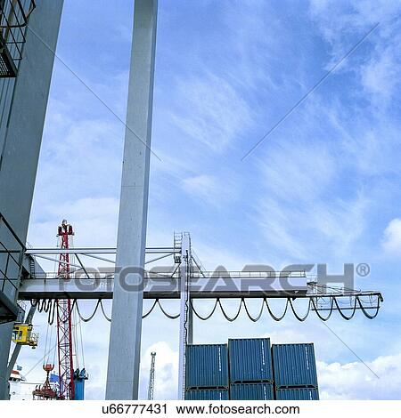 "Gantry crane in port, low angle view" View Large Photo Image Stock Image - "Gantry crane in port, low angle view". Fotosearch