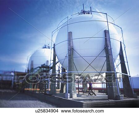 Picture - Gas storage sphere in port. Fotosearch