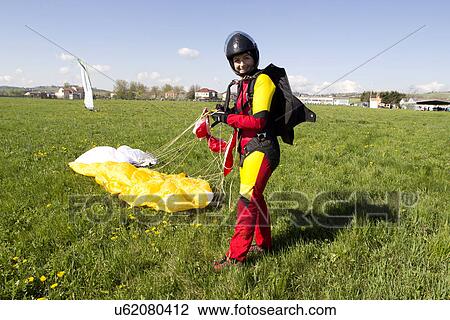 Happy skydiver after jump View Large Photo Image Stock Image - Happy skydiver after jump. Fotosearch