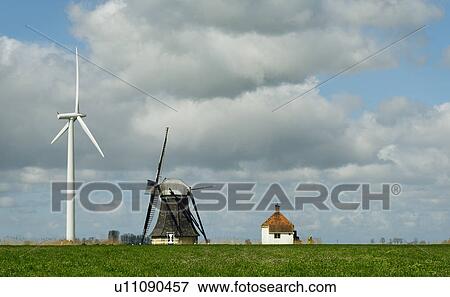 "Landscape with wind turbine and windmill face to face, Workum, Friesland, Netherlands" View Large Photo Image Stock Photo - "Landscape with wind turbine and windmill face to face, Workum, Friesland, Netherlands". Fotosearch
