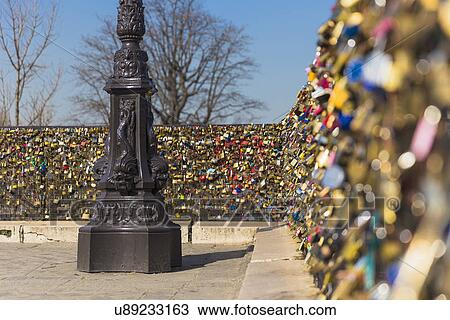Stock Image - "Love Locks, Pont Neuf, Quais de L'Horloge, Ile de la Cite, Paris, France". Fotosearch