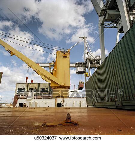 Low angle view of deck on container ship View Large Photo Image Stock Photo - Low angle view of deck on container ship. Fotosearch