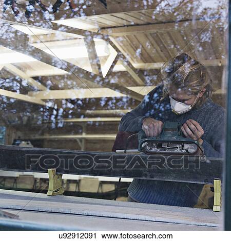 Man working in ski making workshop View Large Photo Image Stock Image - Man working in ski making workshop. Fotosearch