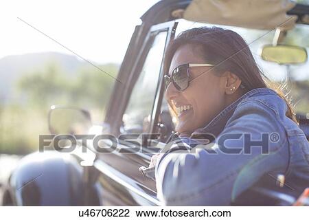 Mature woman in convertible car View Large Photo Image Stock Image - Mature woman in convertible car. Fotosearch