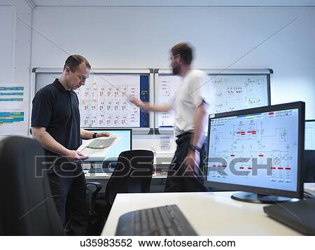 Offshore windfarm engineers in office View Large Photo Image Stock Image - Offshore windfarm engineers in office. Fotosearch