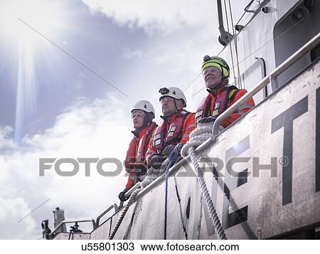 Offshore windfarm engineers in port on deck of ship View Large Photo Image Stock Image - Offshore windfarm engineers in port on deck of ship. Fotosearch