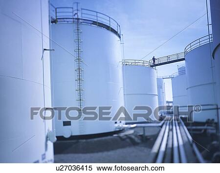 Oil storage tanks in port View Large Photo Image Stock Photography - Oil storage tanks in port. Fotosearch