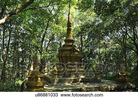 Stock Image - "Pagoda in woods, in shadow of trees, Hangzhou, China". Fotosearch