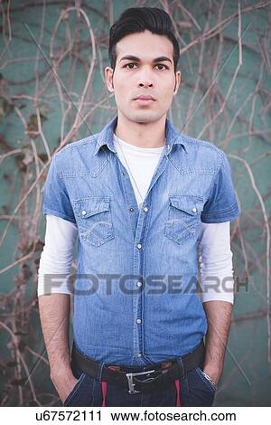 Portrait of a young man View Large Photo Image Stock Image - Portrait of a young man. Fotosearch