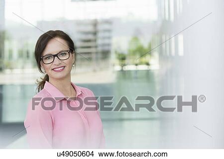 Picture - Portrait of smiling mature woman. Fotosearch
