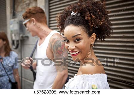 Stock Photography - "Portrait of young woman, smiling". Fotosearch