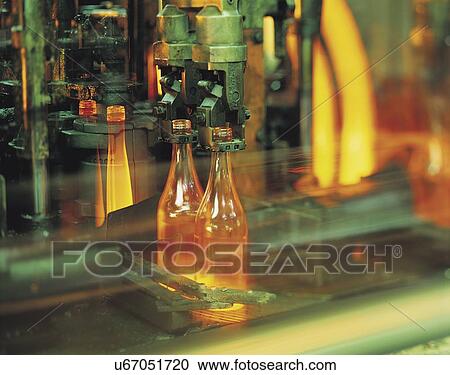 Red hot glass bottles in blowing machine View Large Photo Image Stock Image - Red hot glass bottles in blowing machine. Fotosearch