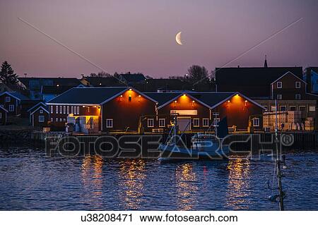 Stock Image - "Reine fishing village at dusk, Norway". Fotosearch