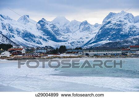 "Reine fishing village covered in snow, Norway" View Large Photo Image Stock Photo - "Reine fishing village covered in snow, Norway". Fotosearch