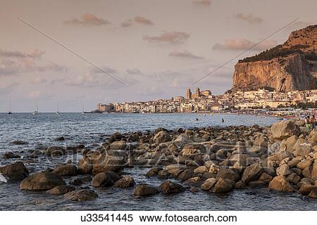 Stock Photography - "Rocks in Mediterranean sea, Cefalu, Palermo, Sicily, Italy". Fotosearch