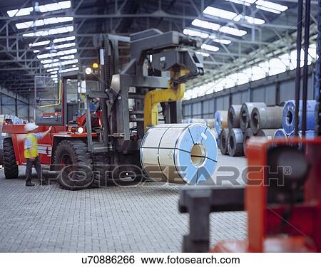 Rolls of steel being loaded in port View Large Photo Image Stock Photograph - Rolls of steel being loaded in port. Fotosearch