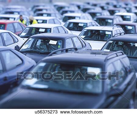 Rows of new cars in storage in port View Large Photo Image Stock Image - Rows of new cars in storage in port. Fotosearch
