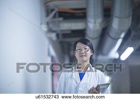 Scientist in control room View Large Photo Image Stock Image - Scientist in control room. Fotosearch
