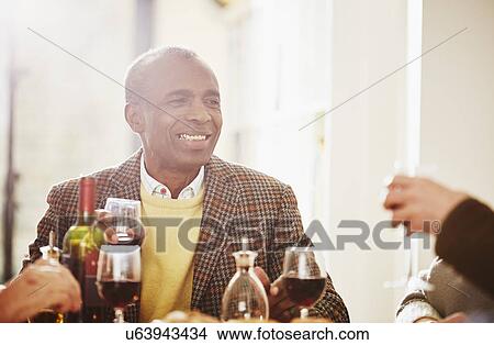 Senior man having dinner View Large Photo Image Picture - Senior man having dinner. Fotosearch