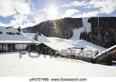 "Snow holiday chalets in front of ski slope, Tyrol, Austria" View Large Photo Image Stock Photograph - "Snow holiday chalets in front of ski slope, Tyrol, Austria". Fotosearch