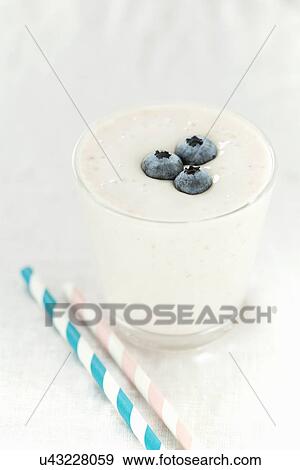 Still life of fresh blueberry smoothie View Large Photo Image Stock Photo - Still life of fresh blueberry smoothie. Fotosearch