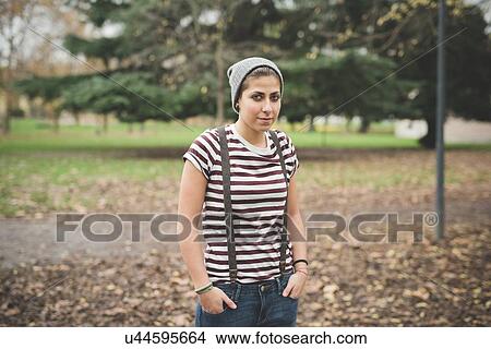 Picture - Teenager in park. Fotosearch