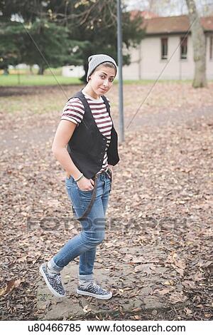 Teenager in park View Large Photo Image Stock Photography - Teenager in park. Fotosearch