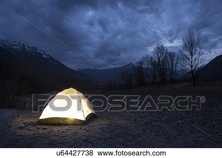 "Tent illuminated at night, Premosello, Verbania, Piedmonte, Italy" View Large Photo Image Stock Photo - "Tent illuminated at night, Premosello, Verbania, Piedmonte, Italy". Fotosearch