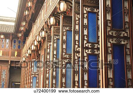 Stock Photo - "Traditional Chinese wood doors and windows lined up in a row, Hangzhou, China". Fotosearch